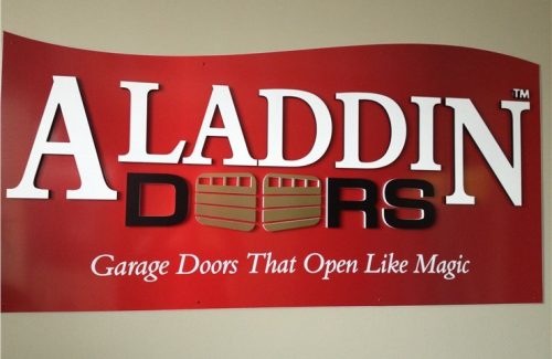 Aladdin Doors sign on wall