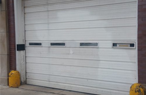 white metal commercial garage door