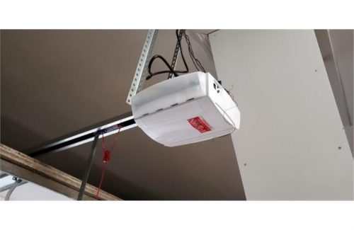 aladdin garage door opener attached to ceiling