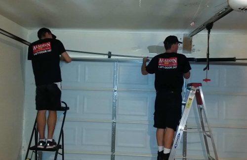 specialists replacing garage door spring