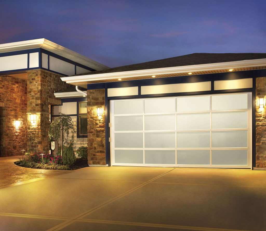 white garage door lit up at night