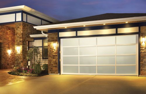 white garage door lit up at night